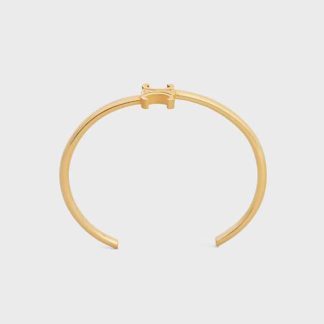 Celine Women Triomphe Asymmetric Cuff in Brass with Gold Finish